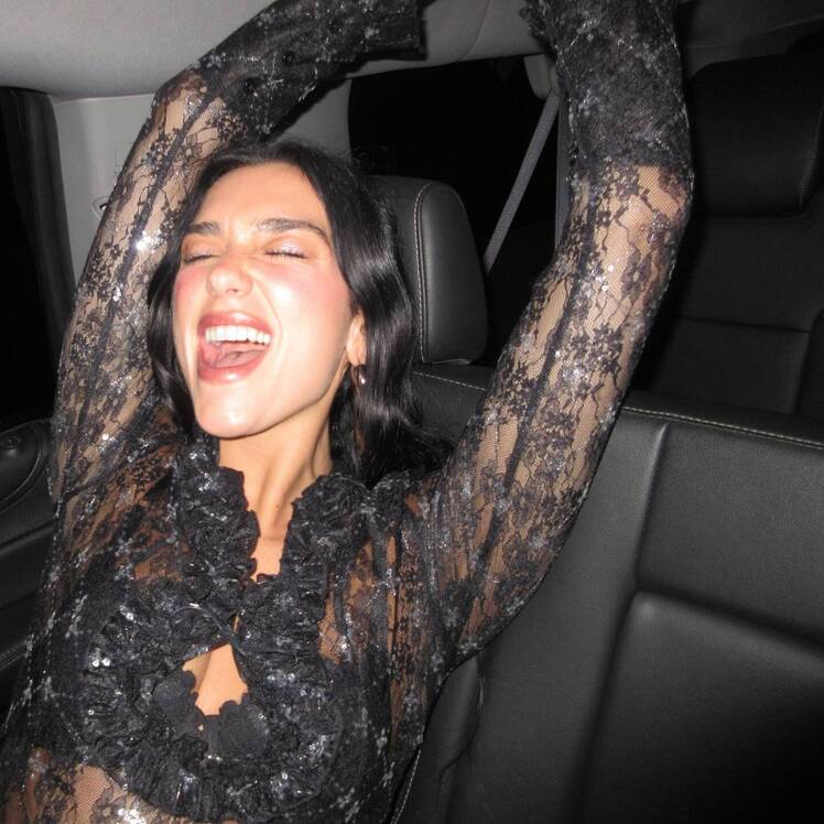 Dua Lipa Lets Loose in Sheer Sequined Top, Turns a Hallway Into a Runway in  South America
